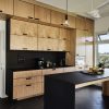 Kitchen with countertops made of Richlite, Bento Build Lattice kitchen cabinet system, Smeg appliances, KOHLER Purist faucet, Plumen 003 Dimmable LED Pendant Set, Modern Fan IC/Air3 fan, Andersen 100 series windows, Ann Sacks herringbone tile floor, Cali Bamboo engineered bamboo floor and Emtek door hardware.